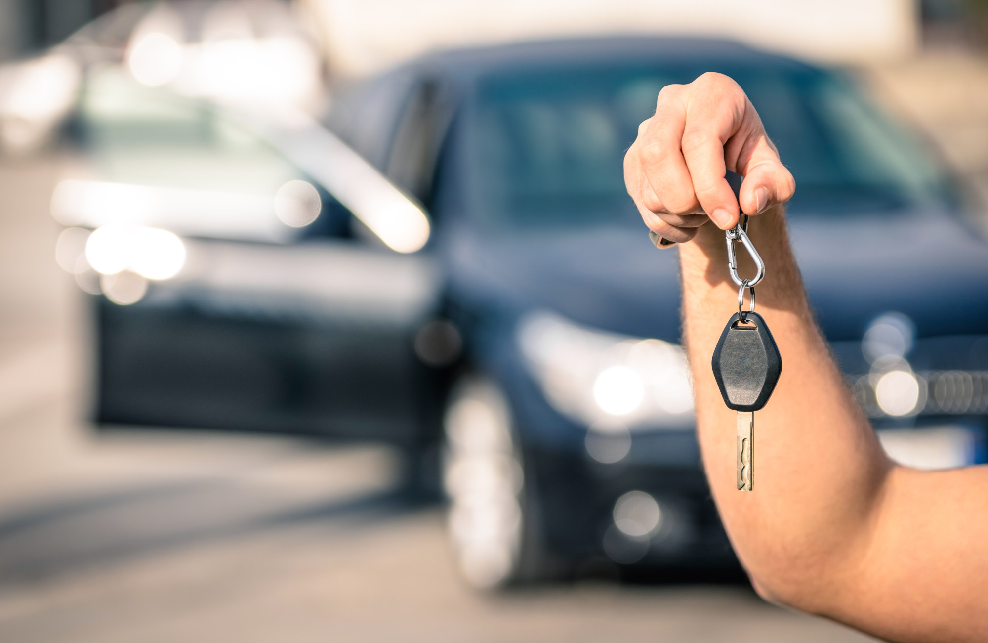 person holding car keys