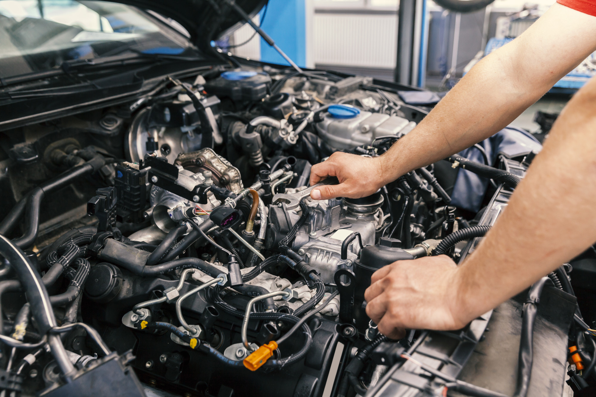 mechanic working on car